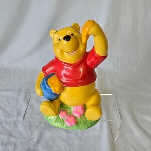 Disney Winnie the Pooh Ceramic Coin Bank Pooh Sitting Eating Honey Figurine